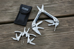 Multitool with various tools and a black pouch labeled 'Defiance Tools' on a white background